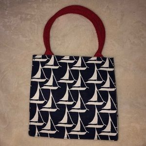 Rock. Flower. Paper sailboat mini bag